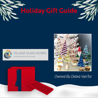 Holiday Gift Guide-Village Glass Works owned by Debra VanTol. With a photo of snowman and Christmas trees made out of stained glass